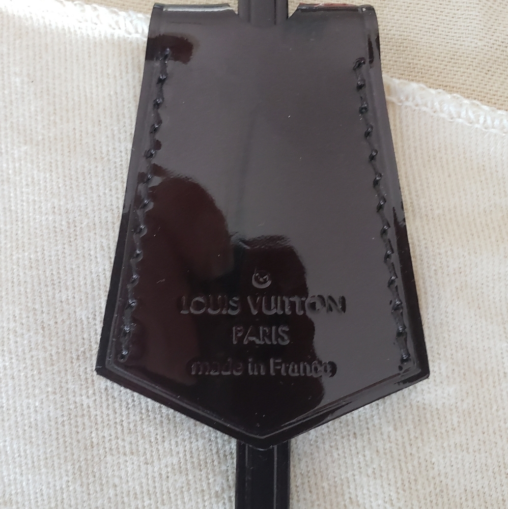 Authentic Louis Vuitton Amarante Vernis Clochette